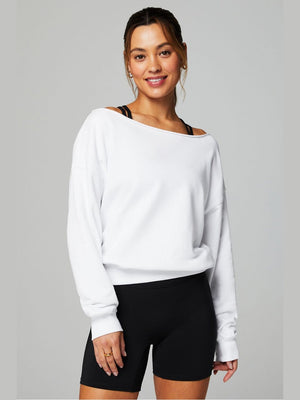 White Fabletics off-shoulder terry sweatshirt with relaxed fit and ribbed cuffs