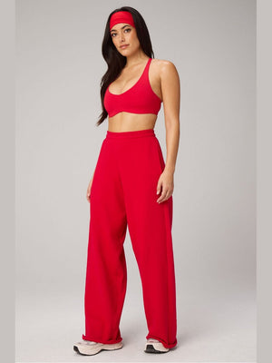 Women's Fabletics red heavy terry wide leg barrel sweatpants with high-waisted elastic waistband and cuffed ankles