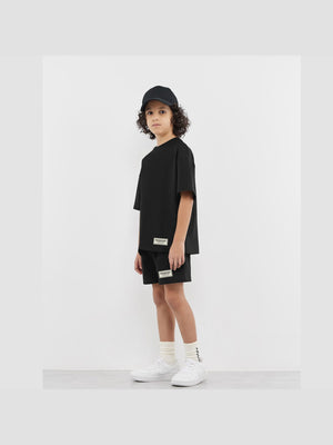 THE GIVING MOVEMENT KIDS SOFTSKIN OVERSIZED T-SHIRT
