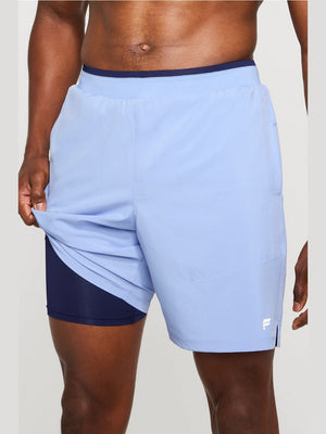Fabletics men's light blue 2-in-1 lined running shorts with navy mesh liner and ribbed waistband