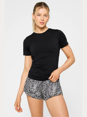 Fabletics Feather Tech+ black short-sleeve crewneck top with moisture-wicking fabric and fitted silhouette