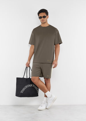 THE GIVING MOVEMENT EMBOSSED CONTRAST PANEL MIDI TRACK SHORTS