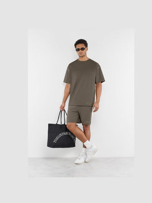 THE GIVING MOVEMENT EMBOSSED CONTRAST PANEL MIDI TRACK SHORTS