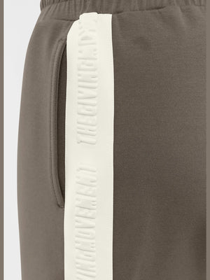 THE GIVING MOVEMENT EMBOSSED CONTRAST PANEL MIDI TRACK SHORTS