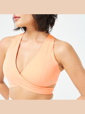 SQUATWOLF RETROGRADE CRISS CROSS BRA TOP
