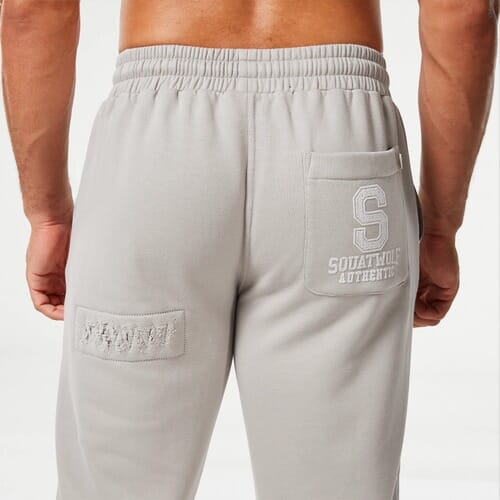 SQUATWOLF GOLDEN ERA RIPPED AND REPAIRED JOGGERS