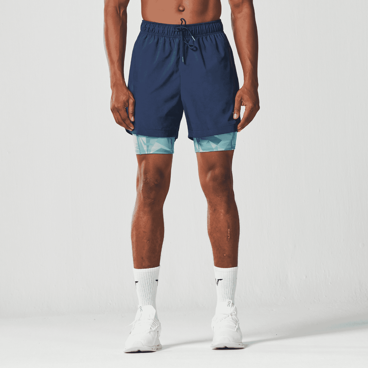 SQUATWOLF LIMITLESS 2-IN-1 7" SHORTS