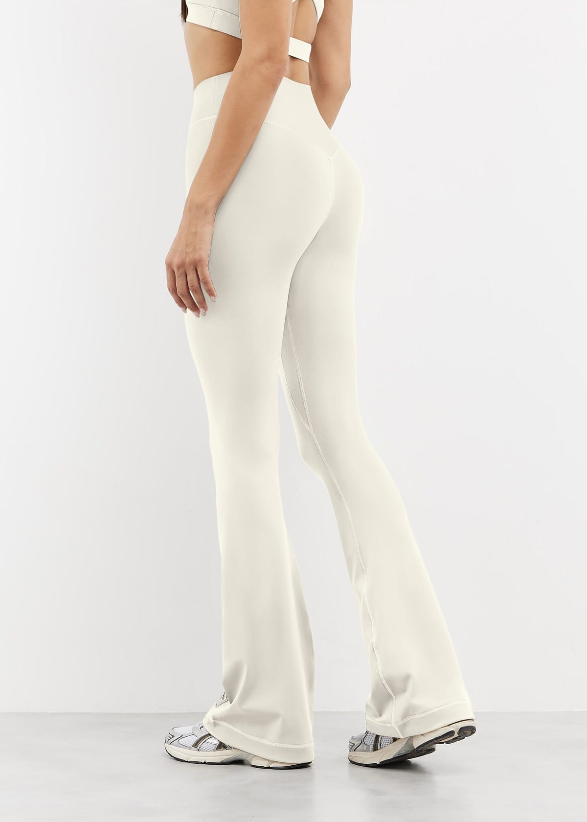 THE GIVING MOVEMENT SOFTSKIN FLARED FRONT SPLIT LEGGING- REGULAR