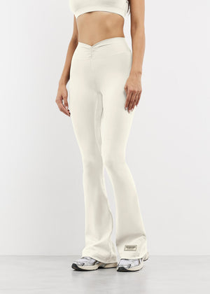 THE GIVING MOVEMENT SOFTSKIN FLARED FRONT SPLIT LEGGING- REGULAR