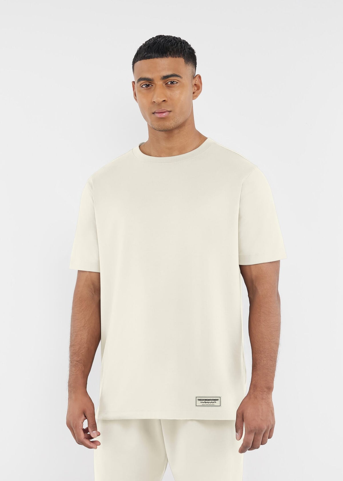 THE GIVING MOVEMENT MEN'S SOFTSKIN REGULAR T-SHIRT