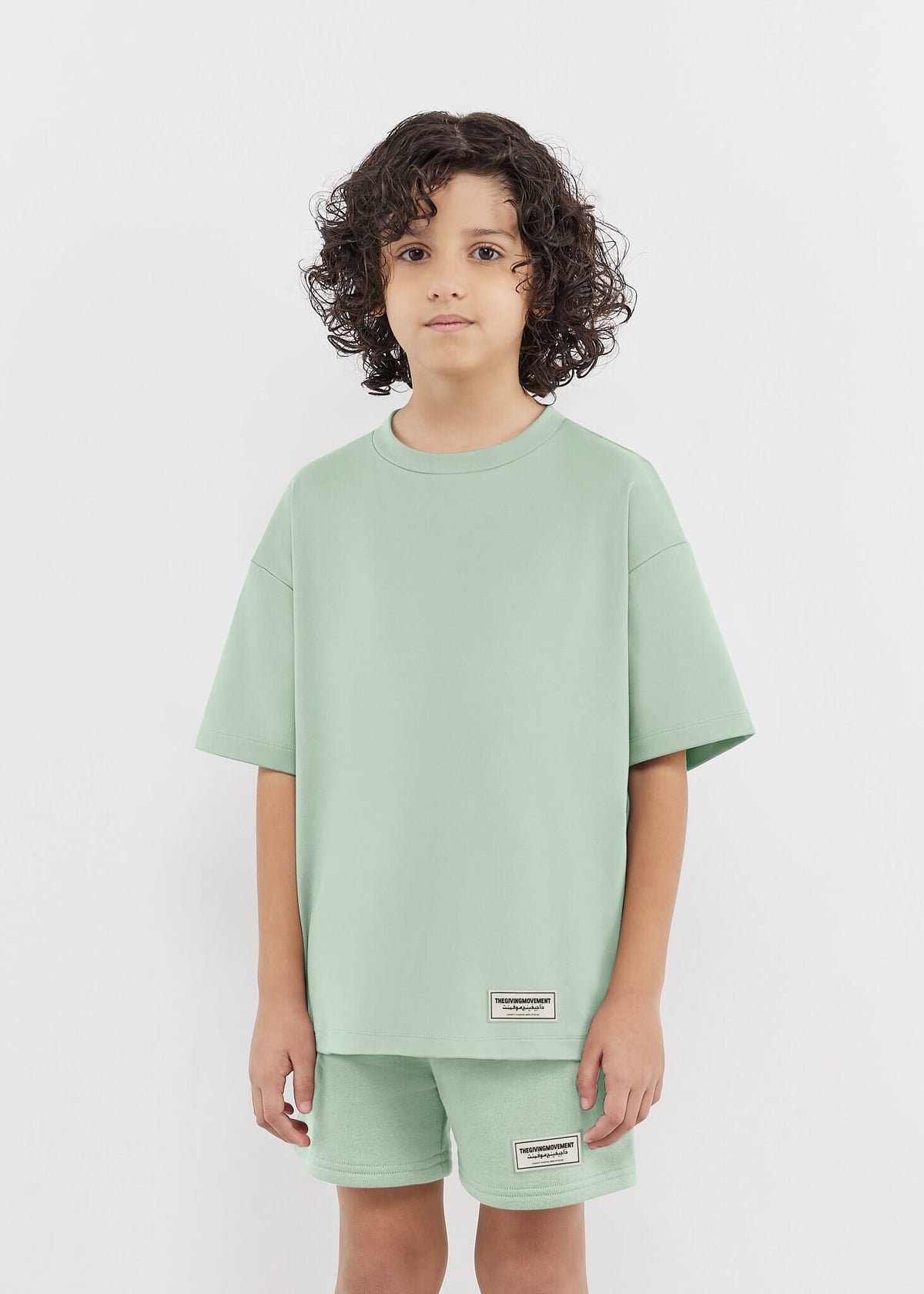 THE GIVING MOVEMENT KIDS SOFTSKIN OVERSIZED T-SHIRT