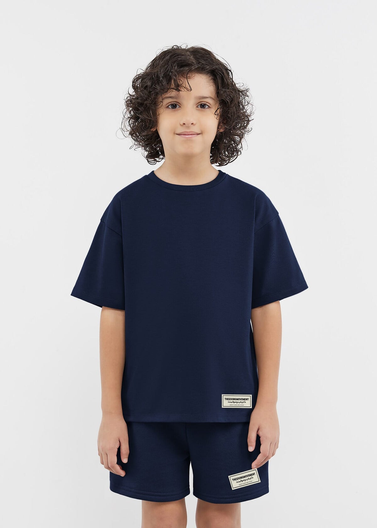 THE GIVING MOVEMENT KIDS SOFTSKIN OVERSIZED T-SHIRT