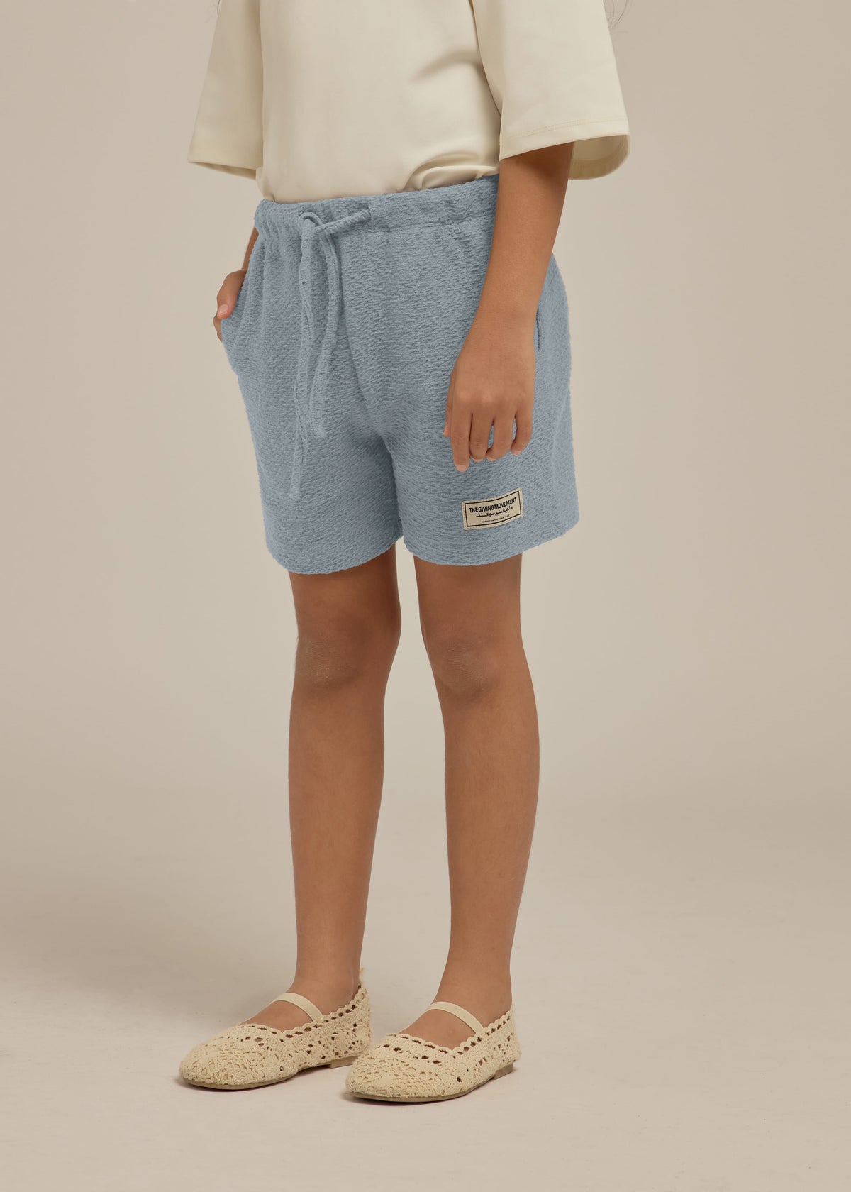 THE GIVING MOVEMENT KIDS RIPPLE JERSEY SHORT