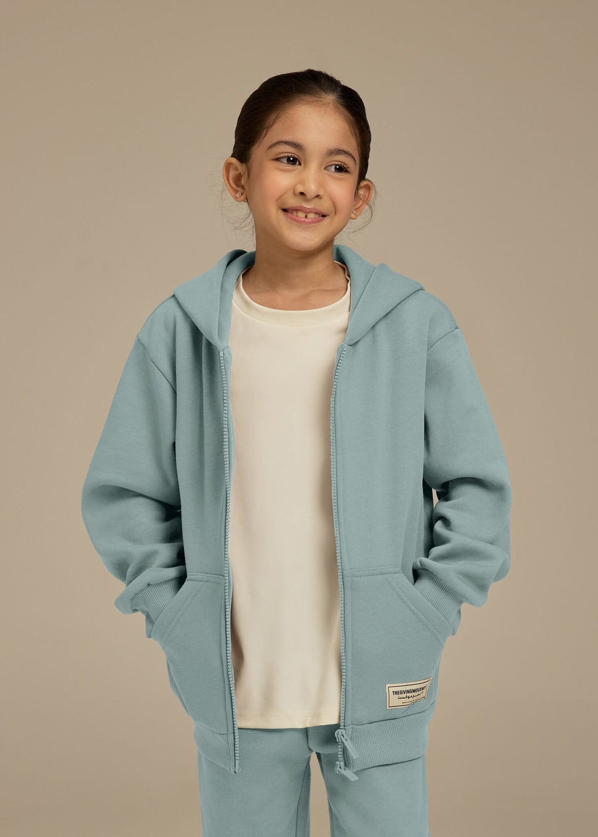 THE GIVING MOVEMENT KIDS ZIP HOODIE