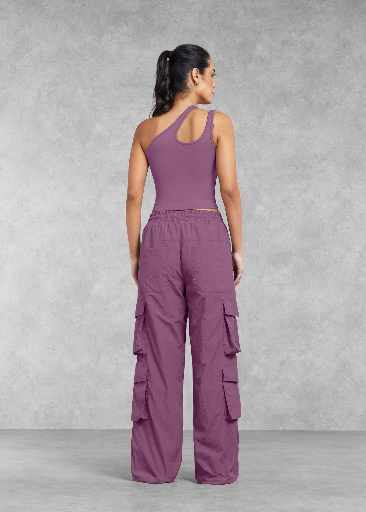 THE GIVING MOVEMENT SOFTSKIN ASYMMETRIC VEST