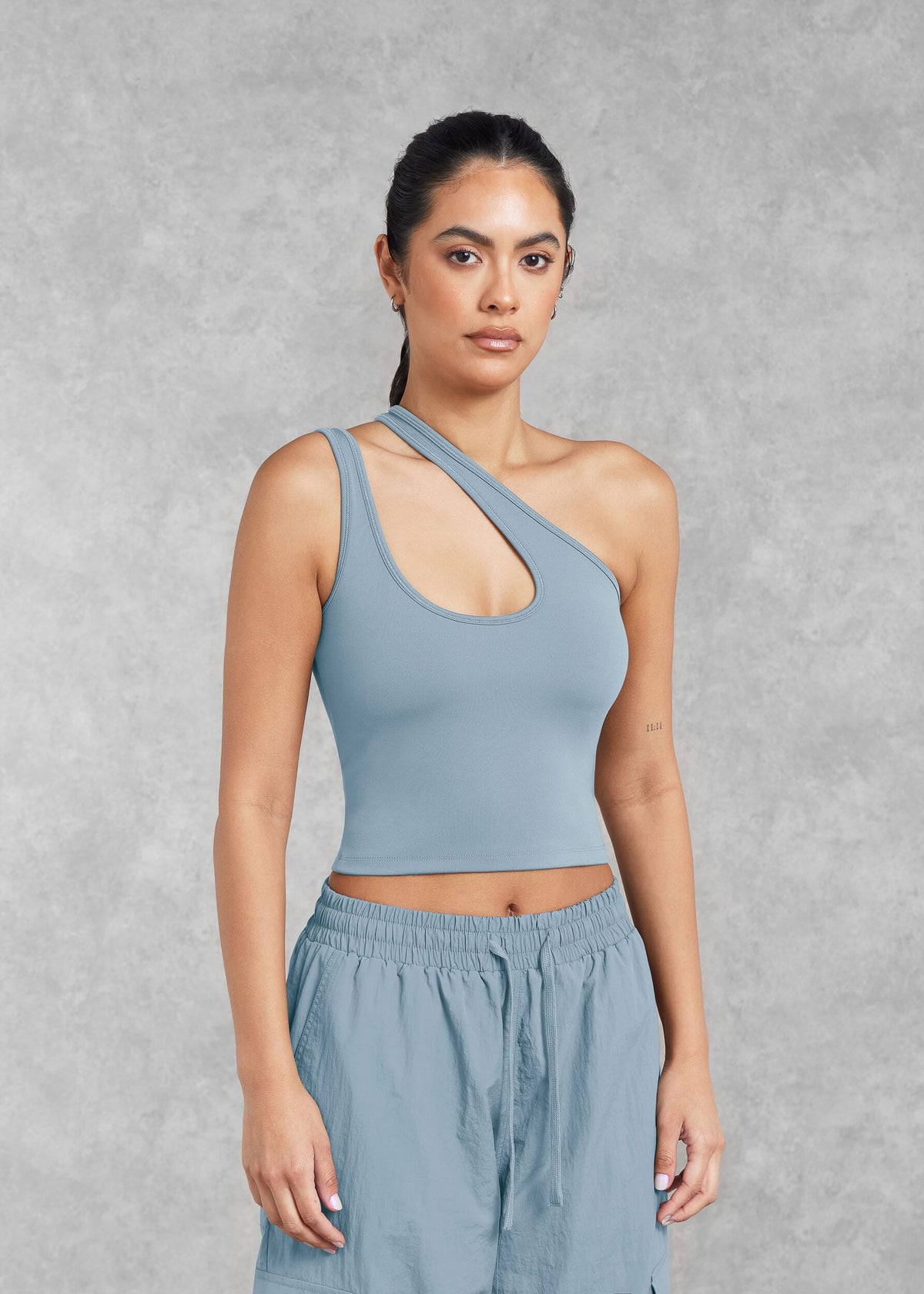 THE GIVING MOVEMENT SOFTSKIN ASYMMETRIC VEST