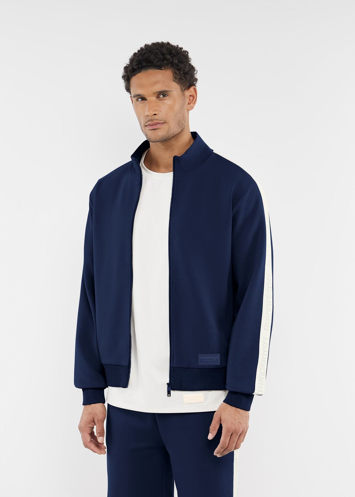 THE GIVING MOVEMENT EMBOSSED CONTRAST PANEL TRACK JACKET